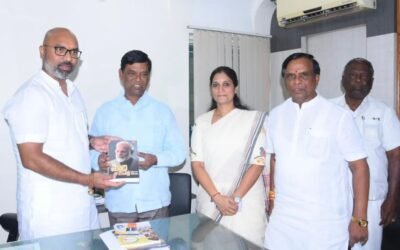 MP Arvind Presents A Book Bearing PM Narendra Modi Government’s Nine-Year Rule Of Service To CA From Nizamabad